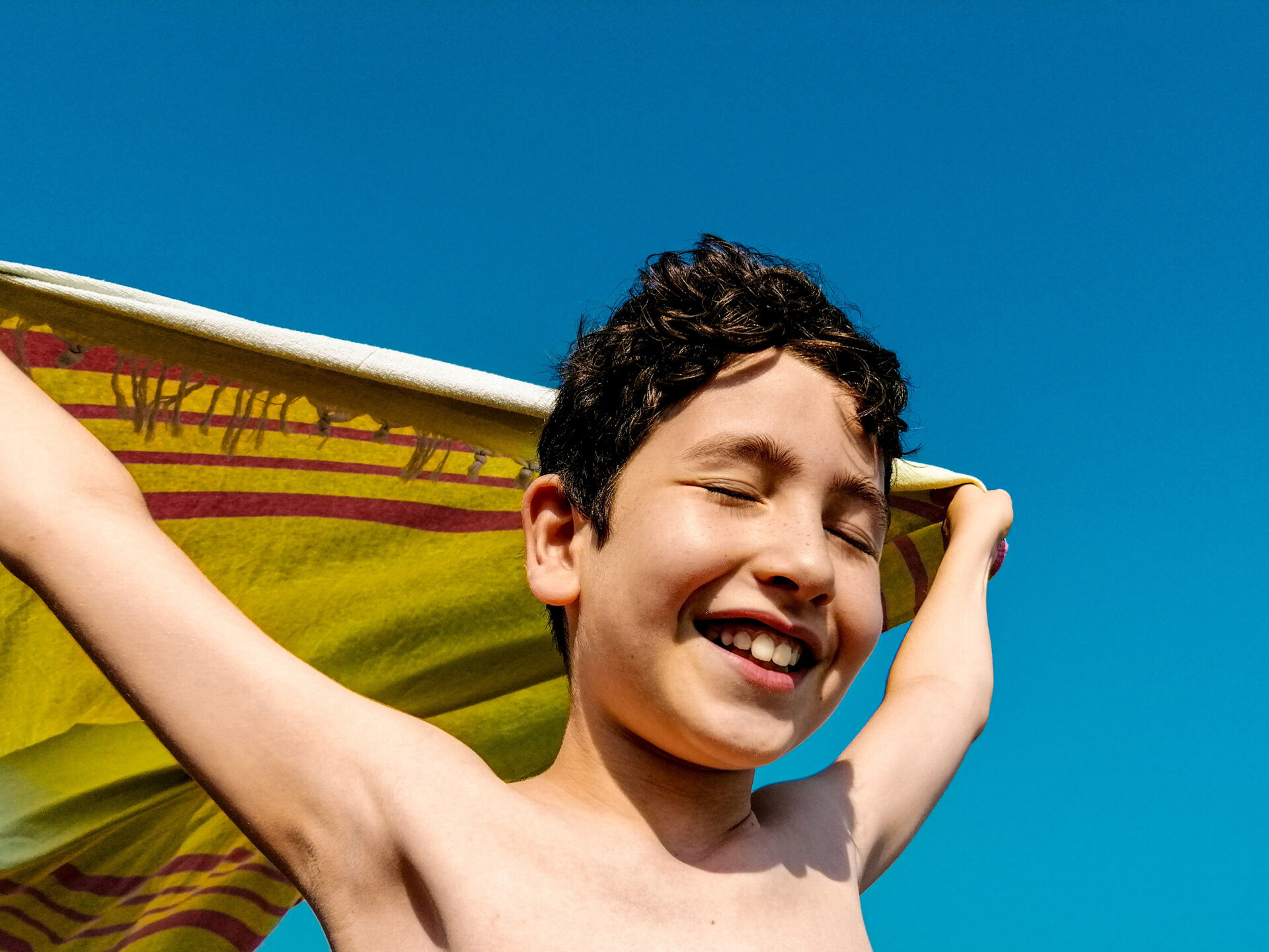 Boy with Yellow Towel