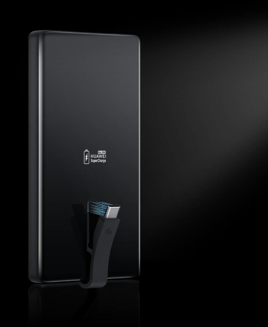 展示了华为自带线全能充移动电源(100 W 12000)自带线的磁吸收纳