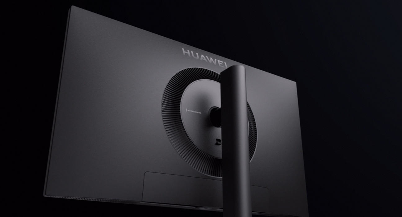 黑色 HUAWEI MateView GT 27 英寸融入生活场景，展示了其背面的星环涡扇美学