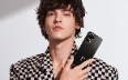 A male model holding a black HUAWEI nova 13