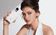 A female model holding a white HUAWEI nova 13