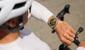 A user wearing HUAWEI WATCH GT 6 Pro is cycling
