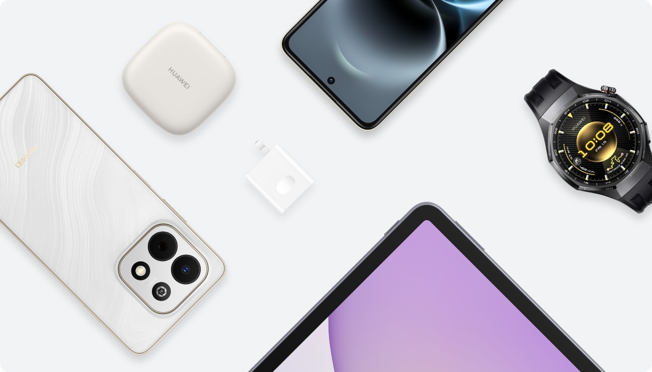 The HUAWEI SuperCharge Wall Charger (Max 40W) is placed on a desktop with headphones, tablets, phones, watches, and other devices nearby, showing the compatibility of the charger