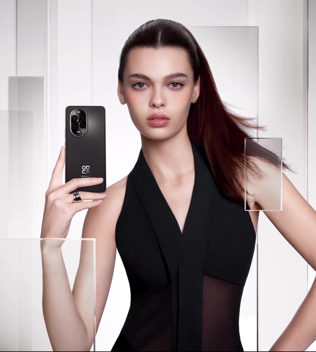 A female model holding a black HUAWEI nova 13 Pro