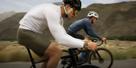 Users wearing HONMA × HUAWEI WATCH GT 6 Pro are cycling