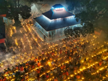 A Sea of Devotion in Candlelight